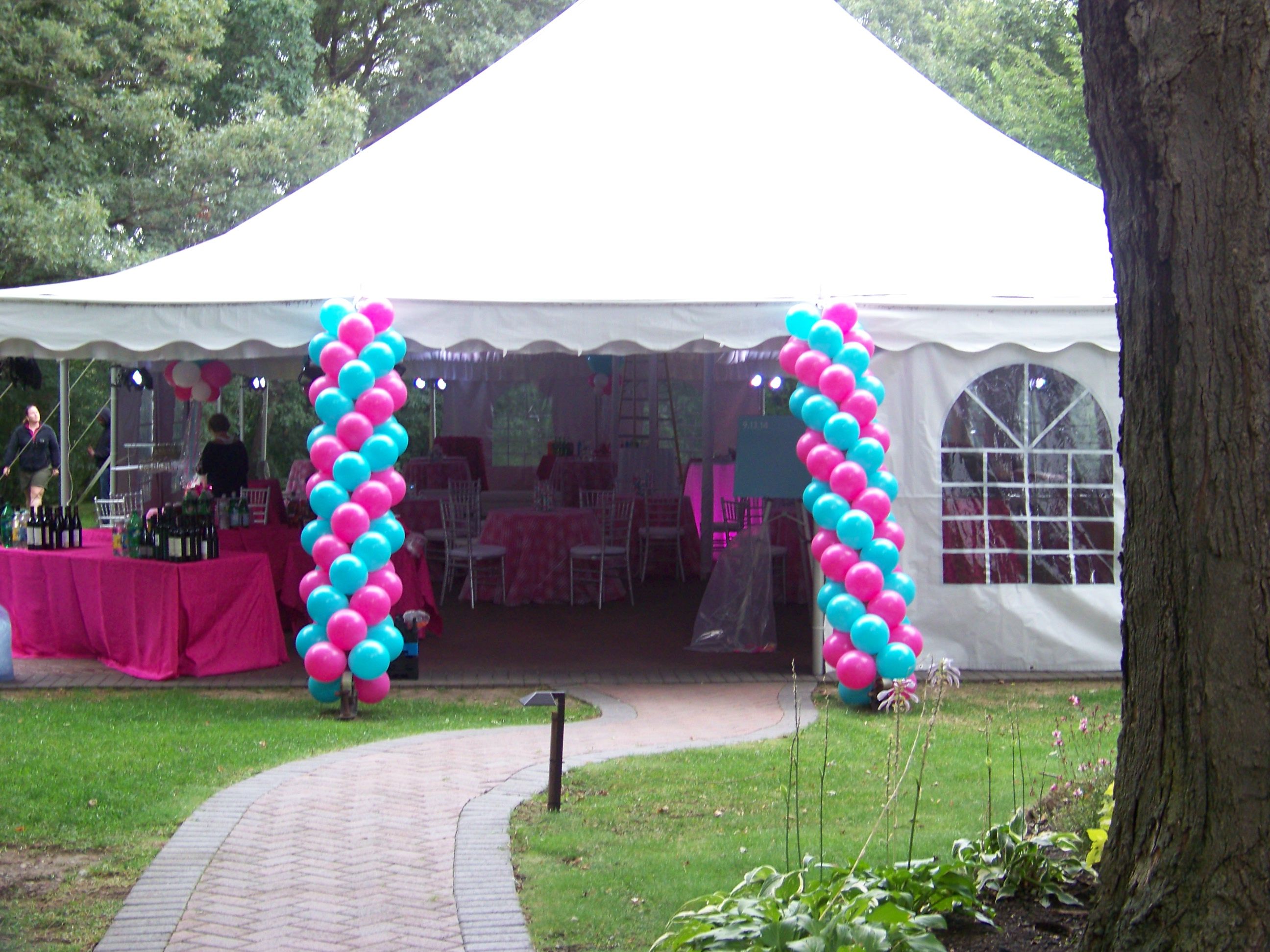Outdoor birthday balloon arch and backdrop
